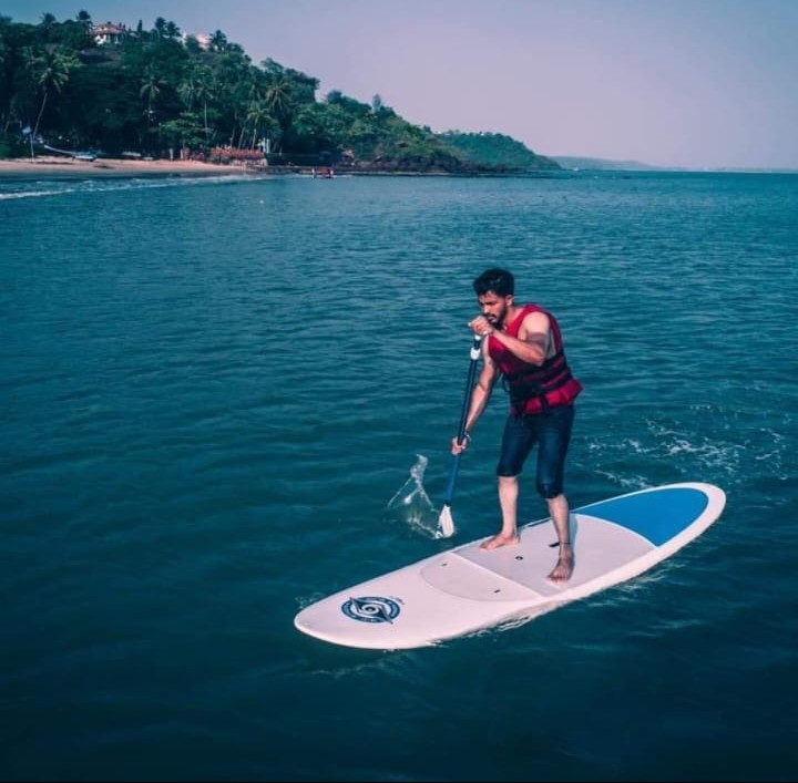 Stand-up paddleboarding as part of the Goa watersports combo