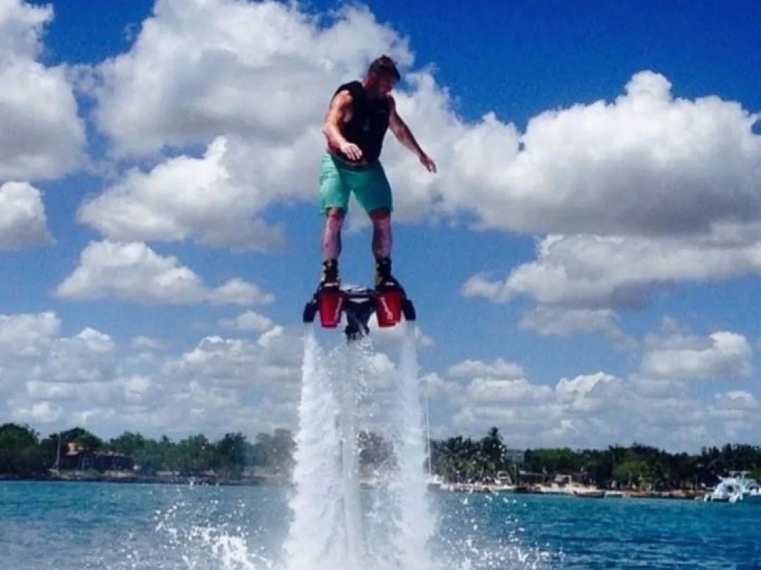 Flyboarder airborne over open water in Goa