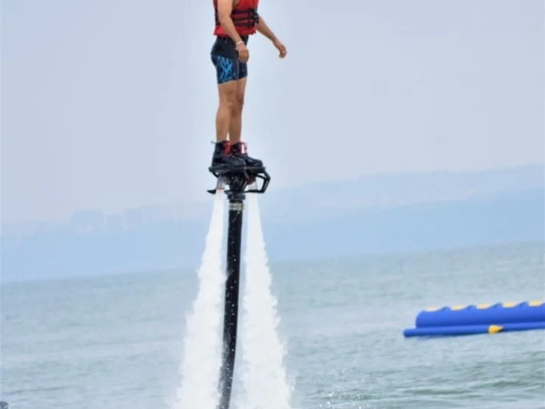 Flyboard instructor safety briefing with yellow helmet, Goa